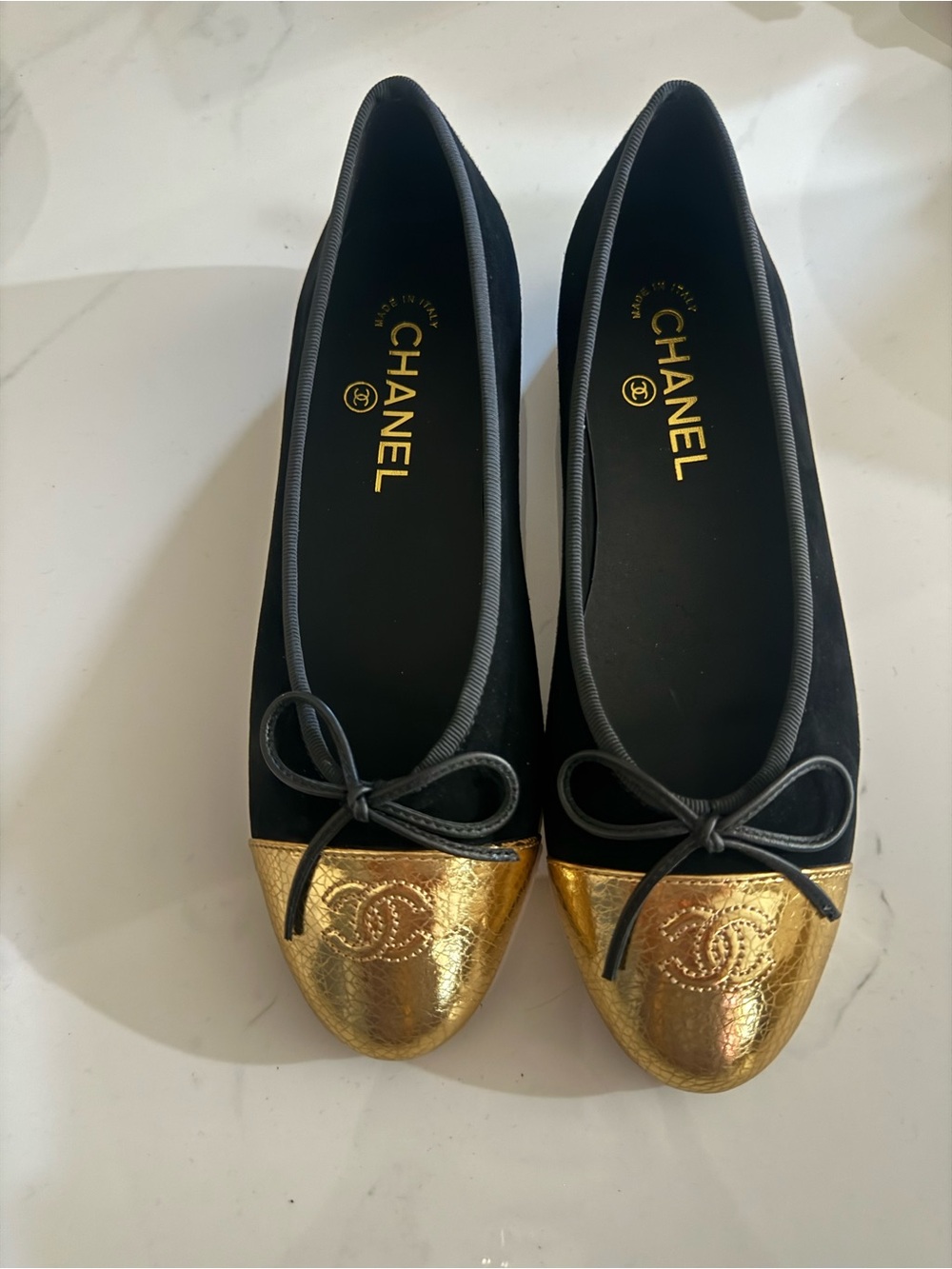 Black and Gold Leather Cap-Toe Ballet Flats Shoes.